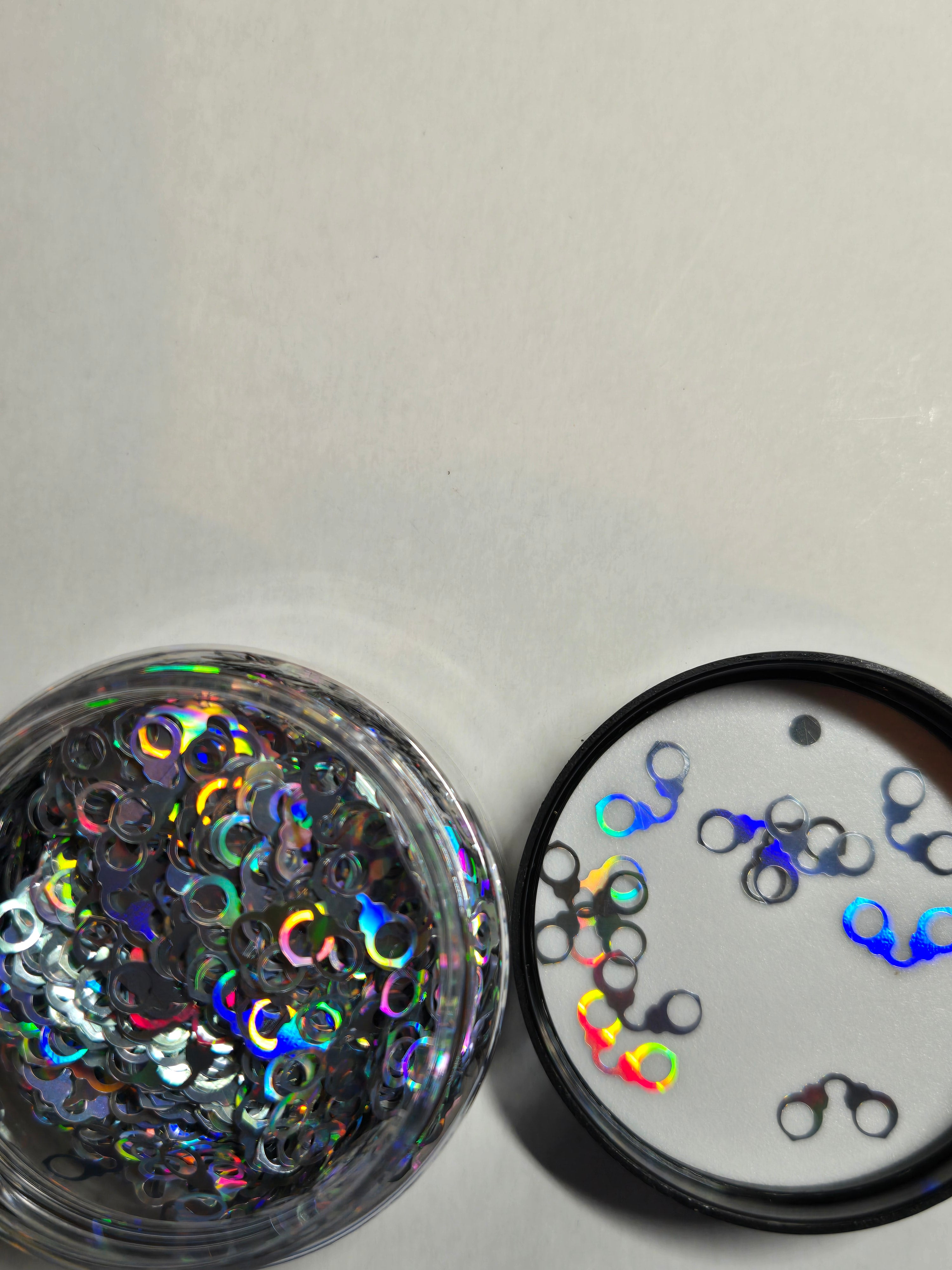 Handcuffs silver glitter shape